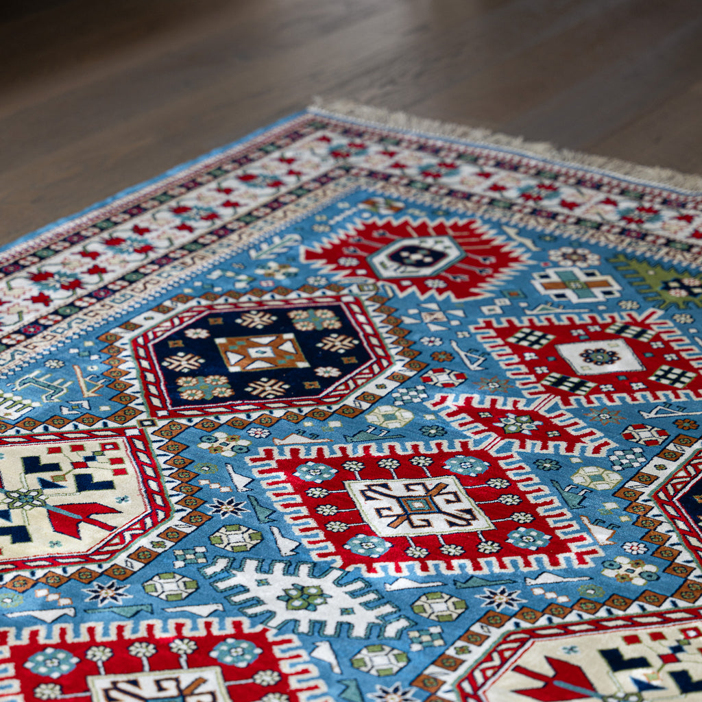 "Shahnezerli" Red on blue silk carpet